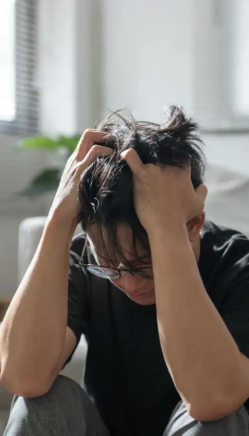 Image of upset man because of erectile dysfunction symptoms Manchester